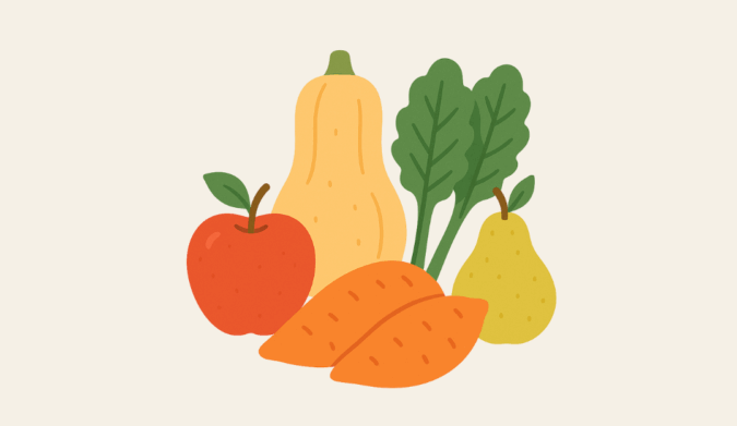 Fall produce: apple, squash, kale, pear, and sweet potatoes.