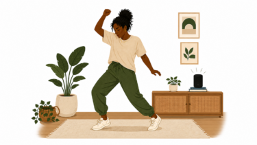 A woman dancing in her living room.